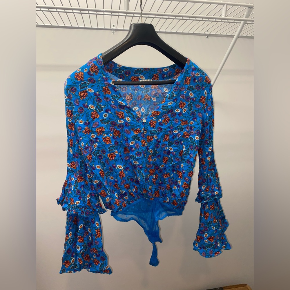 Free People floral body suit.